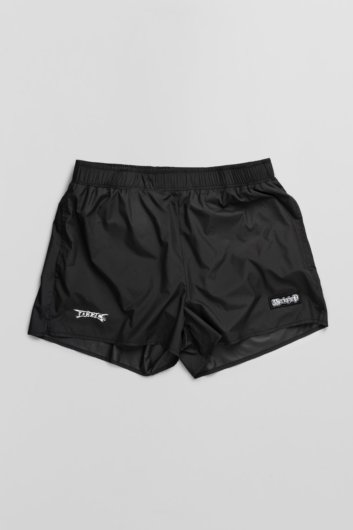 "NO MORE TEARS" SWIM SHORTS