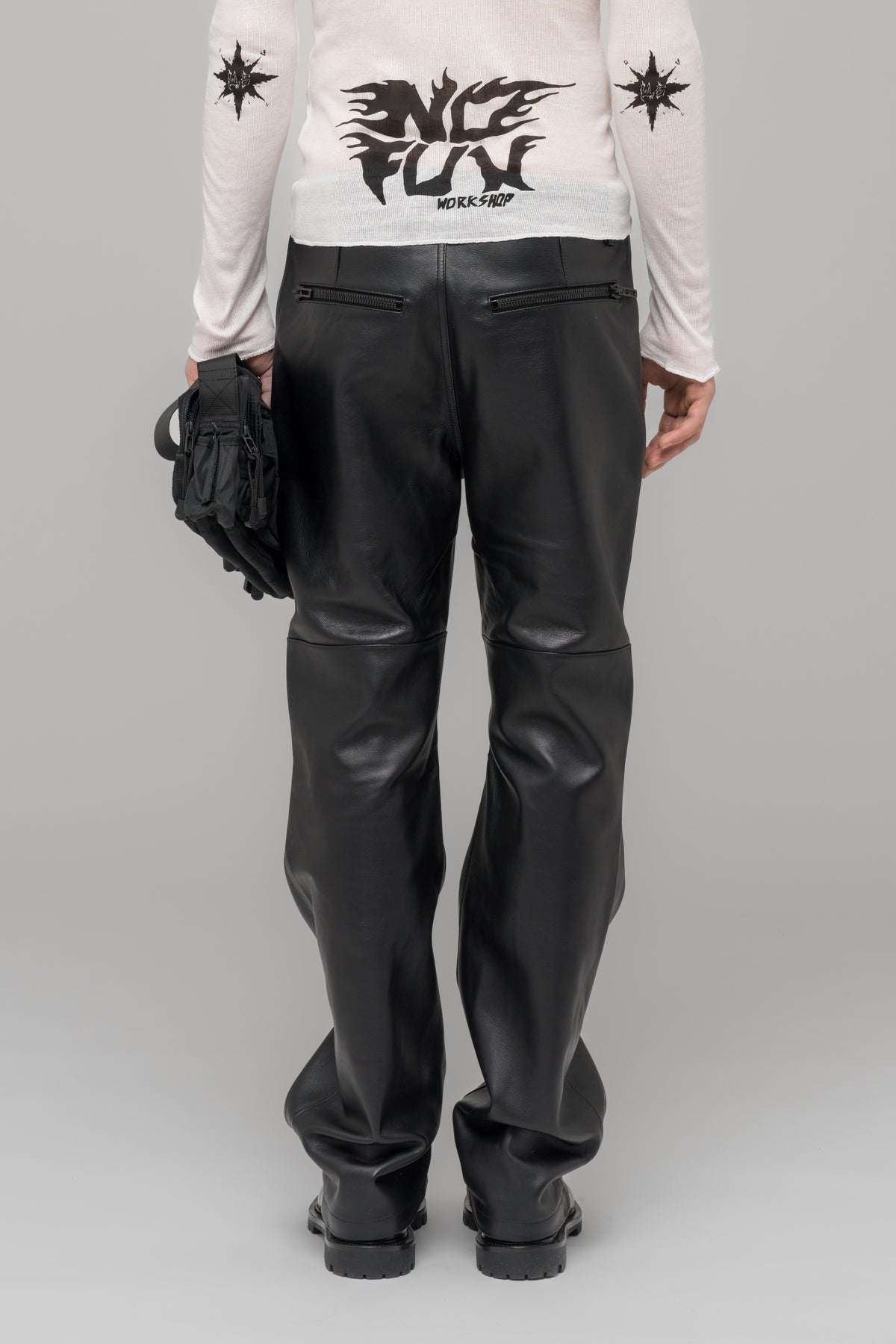 "SINGULAR" LEATHER ZIP TROUSERS